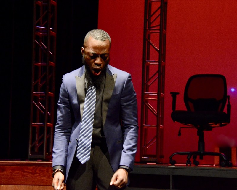 Marc Antony mourns Caesar in YC Theatre's production of Shakespeare's Julius Caesar