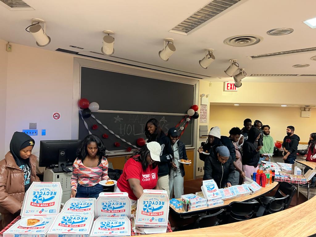 York Pre-Med Club Students pizza day