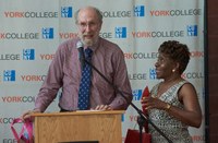 Mondell Sealy presents speaker gift