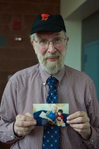 Professor Malkevitch with photo of grandson wearing York t-shirt