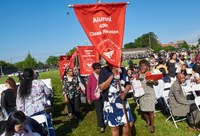 Alumni Marching into the Commencement Tent