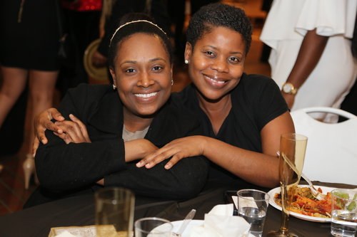 Smiling guests at the graduates dinner