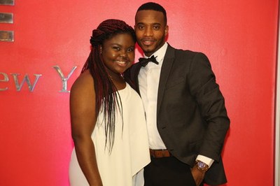 Photogenic couple attending the graduates dinner