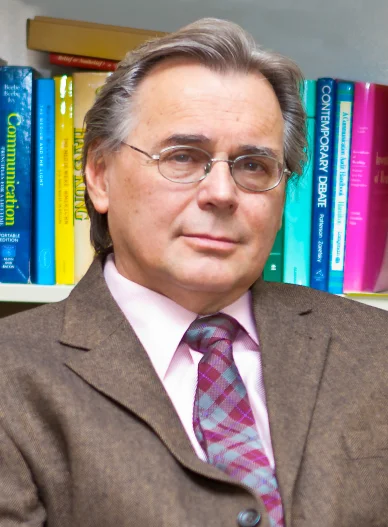 Dr. James Como