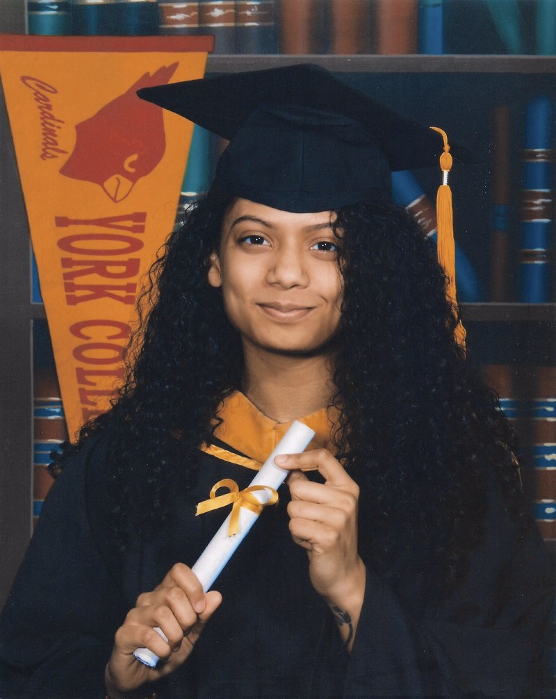 Jasmin Budhan in graduation regalia