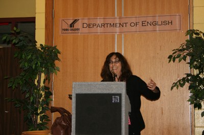 Professor Linda Grasso addressing the faculty and graduates