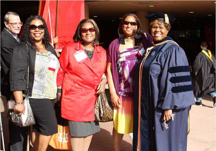 Dr. Jean Phelps posing with York College Alums