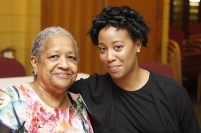 Alum and guest posing for a picture at the 2016 class reunion