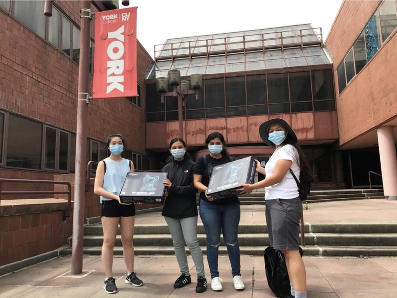 MAA high school students are receiving robot kits from Melanie (far left) and Sol (far right) to conduct python-based research in their respective home setting.