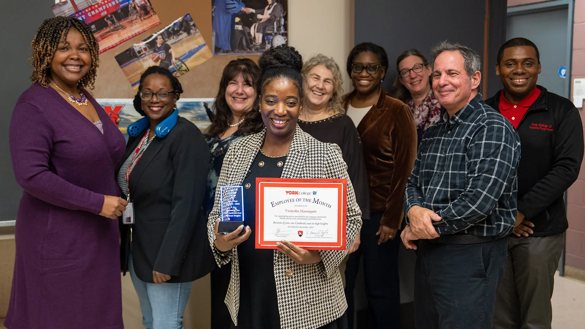 Ms. Massaquoi poses with OT colleagues