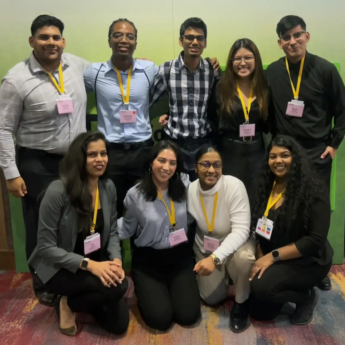 Members of the York delegation gather for another photo op during the Deloitte Summit, where they met Deloitte executives and students from other institutions.
