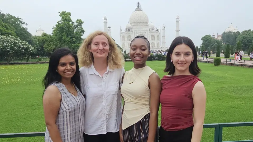 Economics Professor Dr. Efstathia Korkou, and students Mansi Thakkar, Farushe Aliaj, and Stephania Monestime.