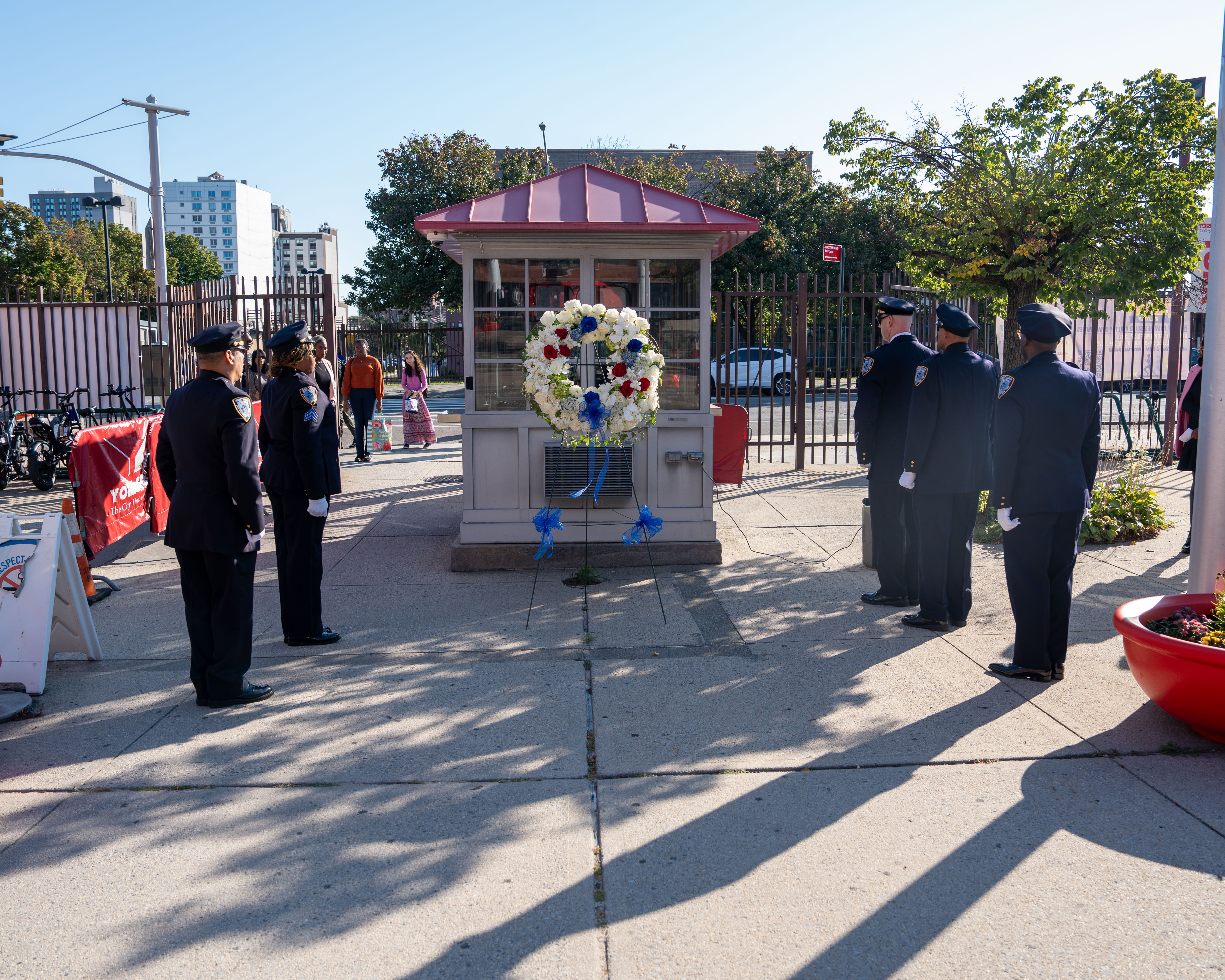 Public safety officers stand at attention at the wreath-laying ceremony. 