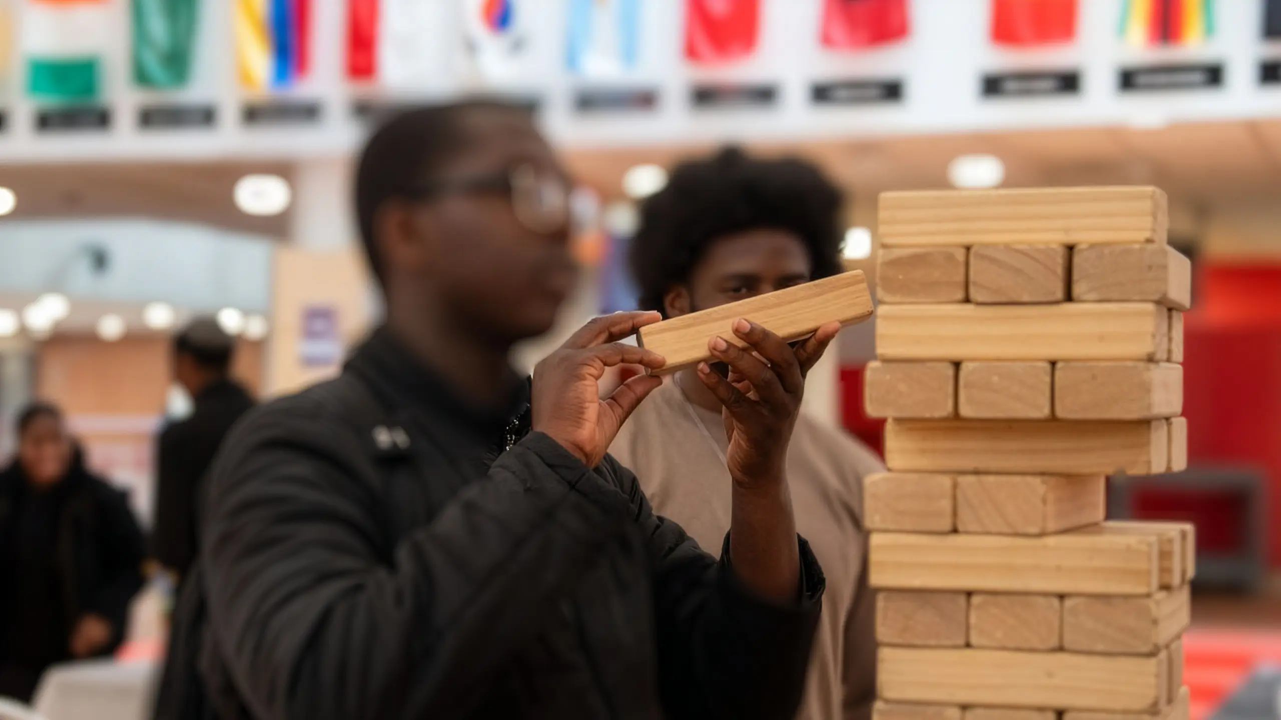 Financial Aid students playing jenga