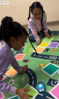 Kids playing with robot